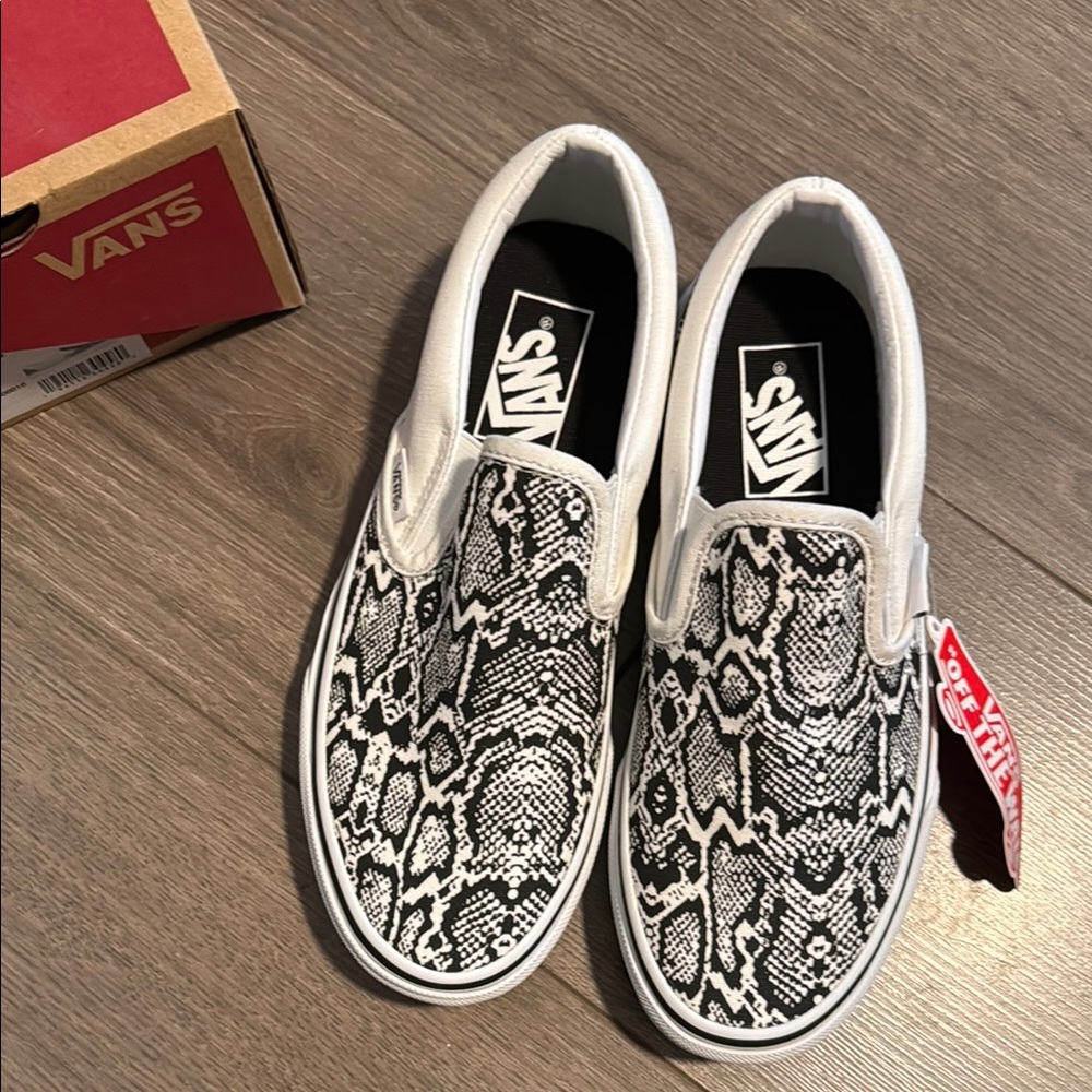 Vans Black and White Slip-On Sneakers - Picture 2 of 9